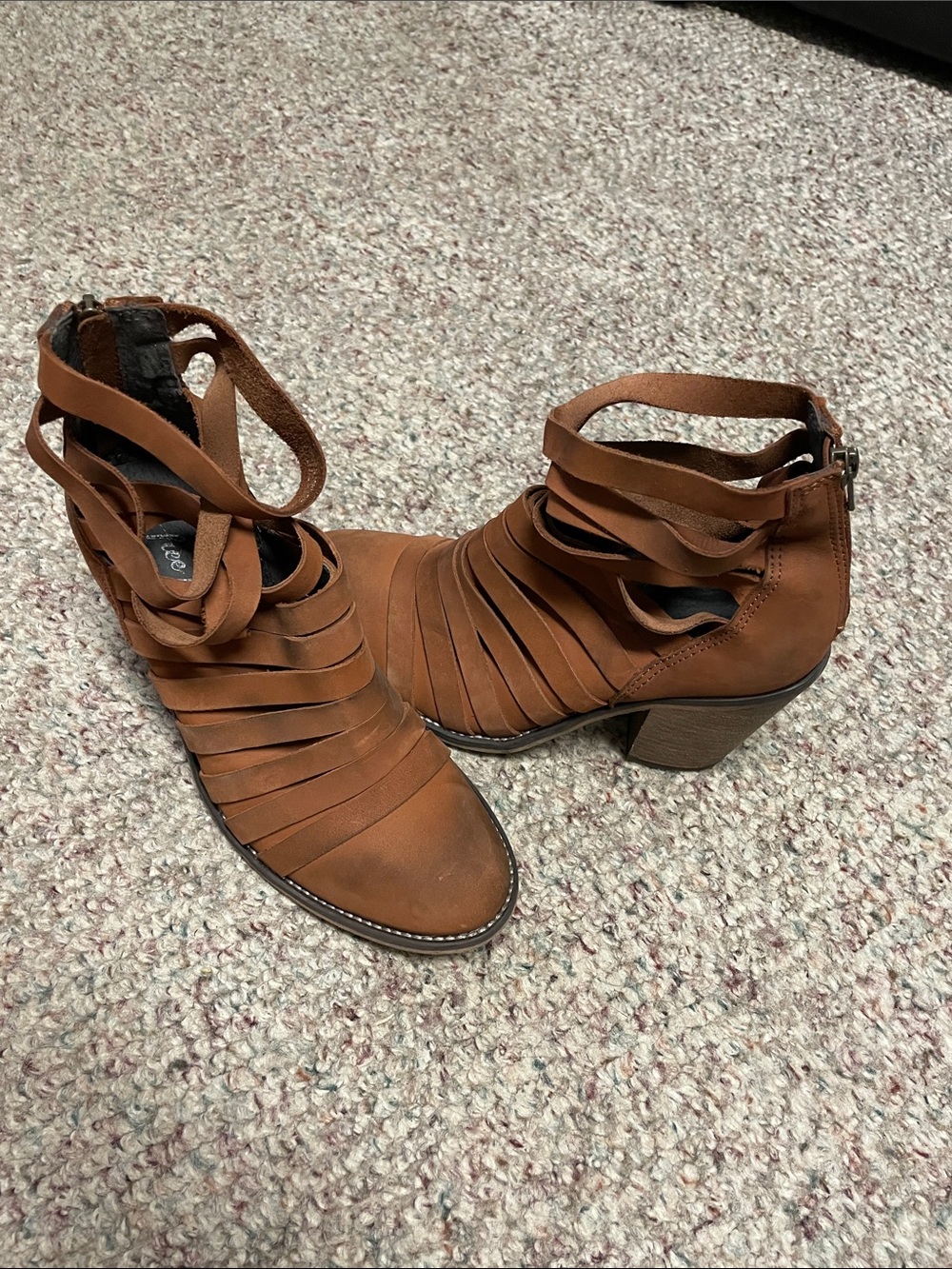Free people distressed look zip back brown heeled booties